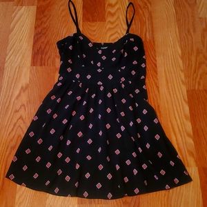Express spring dress, smocked back, has pockets! Size medium